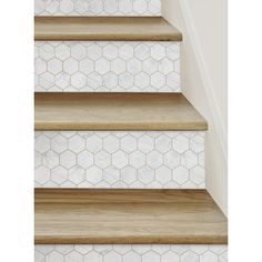 some stairs with white tiles on them