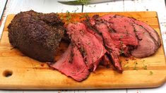 the meat is cut up and ready to be served on the cutting board for consumption