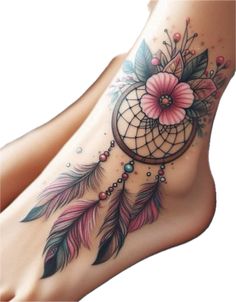 a woman's foot with a tattoo on it and flowers in the middle of her leg