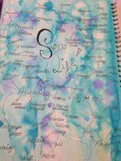 a spiral notebook with words written in cursive writing