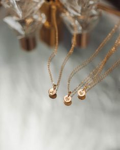 The no-stress way to dress your entire bridal party—curated by us, discounted for you! This bridesmaid jewelry set includes your choice of up to seven Personalized Yue Necklaces crafted in one chosen metal, each with their own initial. These are pieces they’ll love on your wedding day and wear all the days after—meaningful gifts and timeless looks all in one. Each necklace arrives packaged separately in our sleek new gift-ready boxes, with letterpress cards to fill out at home. To order, select Dainty Formal Initial Necklace, Elegant Initial Pendant Jewelry For Wedding, Delicate Charm Necklaces For Bridesmaid Gift, Dainty Bridal Necklace For Bridesmaid Gift, Minimalist Charm Necklace With Delicate Chain For Bridesmaids, Minimalist Delicate Chain Charm Necklace For Bridesmaids, Elegant Wedding Initial Necklace, Elegant Personalized Wedding Charm Necklaces, Personalized Elegant Wedding Charm Necklaces