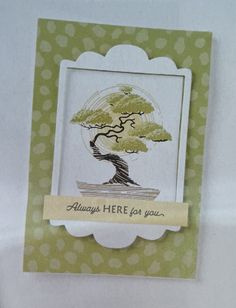 there is a card with a tree on it