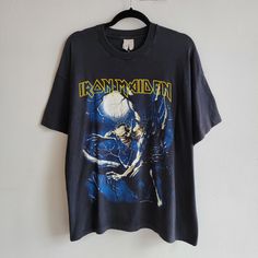 A vintage Iron Maiden tee from 1992 with a screen stars tag. The tee is 100% cotton and fits like an XL. It's in great condition, perfectly worn with no flaws.  Chest - 22.5" Length - 29" Iron Maiden Shirt Outfit, Metalica Tshirt Vintage, Heavy Metal Shirts, Iron Maiden Merch, Iron Maiden Shirt, Heavy Metal Shirt, Iron Maiden T Shirt, Fear Of The Dark, Vintage Iron Maiden Shirt