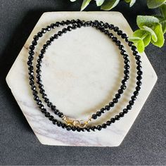 This Elegant Black Tourmaline Beaded Necklace Is Designed To Provide Protection Against Negative Energy And Promote A Sense Of Security And Well-Being. The Polished Beads Are Strung Together To Create A Stylish Accessory That Can Be Worn Daily To Ward Off Negativity And Enhance Inner Strength. Whether Worn Alone Or Layered With Other Necklaces, This Black Tourmaline Beaded Necklace Is A Versatile Piece That Not Only Adds A Touch Of Sophistication To Any Outfit But Also Serves As A Powerful Talis Black Tourmaline Necklace, Gemstone Choker, Black Bead Necklace, Black Choker, Tourmaline Necklace, Tourmaline Beads, Tourmaline Gemstone, Unique Handmade Jewelry, Black Tourmaline