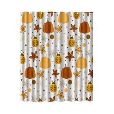 a shower curtain with pumpkins, bees and leaves on it's white background