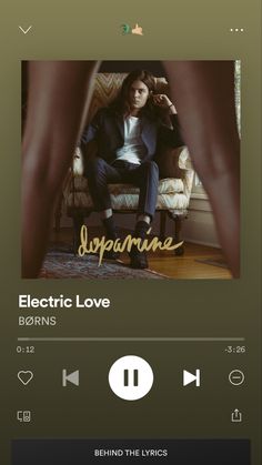 an image of a woman sitting in a chair with the words electric love on it