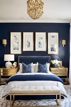 a bedroom with blue walls and gold furniture in the corner, along with pictures on the wall