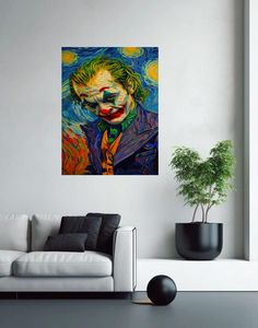 a living room with a couch and a painting on the wall above it that has a joker face painted on it