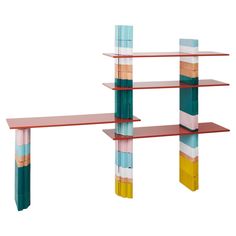 three shelves with different colored sections on each shelf and one is made out of plexed wood