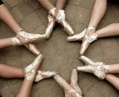 there are many pairs of ballet shoes arranged in a circle