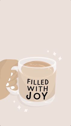 a cup of coffee with the words filled with joy