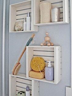 bathroom shelves with soaps, toothbrush and other items