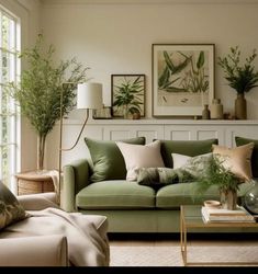 a living room filled with lots of furniture and plants on top of the couches