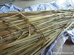 a pile of straw sitting on top of a table