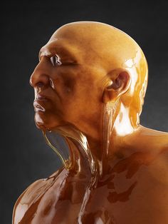 a man is covered in caramel colored liquid