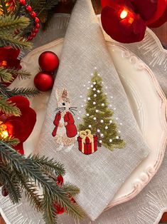 a white plate topped with a christmas tree on top of a table