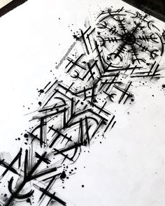 some black and white graffiti on a piece of paper