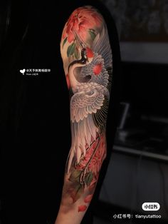 a person with a tattoo on their arm