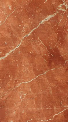 an orange marble floor with white lines on it