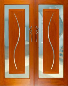 The Aqua front door handle mounted on these double doors is a truly awesome look.  Made from solid Stainless Steel. Its design has that special character that is difficult to define. I've not seen anything that compares to the Aqua for style and beauty. It is a Pull Handle that makes a statement about the home it adorns. Pull Handle, Special Characters