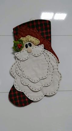 a christmas stocking with a santa clause on it