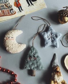 christmas ornaments are laid out on a table