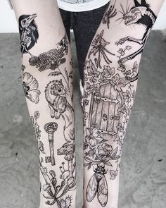 a person with tattoos on their legs