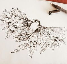 a drawing of a bird with flowers on it's back and wings drawn in pencil