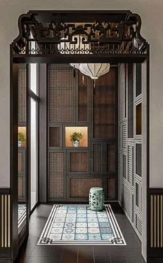 an entry way with wood paneling and tile flooring in front of a window