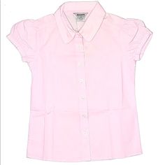 New With Tags Pink Dress Shirt For Girls Size 6-8. Closure Type: Button Sleeve Type: Short Puff Sleeve Material Composition: Cotton/Polyester Oxford Fabric Color: Pink Features:Classical School Uniform Design, Puff Sleeve, Casual, Solid Color, Well Match Girl's Poodle Skirt More Details: Plastic Buttons, Cotton Blend, Contrast Binding Around Neck, Garment Wash Washing And Ironing : Wash With Dark Colors, Gentle Machine Or Hand Wash, Do Not Tumble Dry, Do Not Iron, Do Not Dry Clean. Classic Tops For School In Spring, Classic Spring Tops For School, Preppy Pink Collared Top, Cute Pink Tops For School, Preppy Button-up Top For School, Preppy Fitted Pink Top, Fitted Pink Cute Shirt, Casual Pink Shirt For School, Pink Summer School Tops