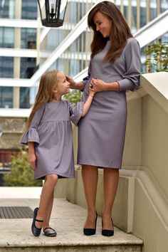 ★ABOUT★ Unique and very elegant dress set for mum and daughter. The mum's dress is adorned with a beautifully arranged puff sleeve with a tight cuff. Daughter's dress has a 3/4 sleeve  with a beautiful finish. The Royal collection is a year-round proposition for Mothers and Daughters who want to shine at any special event.   Non-obvious color and high-quality fabric. In the close-up you can see the fabric, on the photo  looks like heather color  Add accessories (like: bow, sheath)  for the entire family to complete the look. Weddings, family events, holidays, formal meetings- these are just a few suggestions for the Royal collection.  ★FEATURES★ 1. Universal, comfortable, and feminine design 2. Impressive puff sleeve  3. Girl's dress can serve as tunic when it becomes too short 4. Natural Mother And Daughter Clothes Set, Elegant Long Sleeve Matching Set Dresses, Elegant Spring Matching Set Dresses, Matching Mother Daughter Outfits, Mum And Daughter, Daughter Outfits, Mothers And Daughters, Mother Daughter Matching Outfits, Splendid Dress