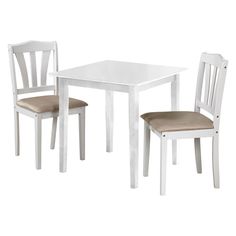 a white table and two chairs sitting next to each other