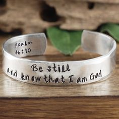 "Take a LOOK at our Website: ANNIEREH.com Be Still and Know I am God Bracelet, Bible Verse Bracelet, Psalm 4610, Scripture Bracelet, Scripture Jewelry, Faith Bracelet for Her Customize your Cuff with your favorite Bible Verse. Let us know the info for the inside and outside of cuff. This cuff comes in aluminum, copper, or brass with a beautiful decorative texture on the outside. ** Bracelet is approx 6\" long and 3/8\" wide this bracelet can be designed in a size 7\" or 8\" Size 6\" is for avera God Bracelet, Scripture Bracelet, Verse Bracelet, Impress Art, Decorative Texture, Favorite Bible Verse, Secret Message Bracelet, Bible Verse Bracelet, Custom Cuff Bracelet