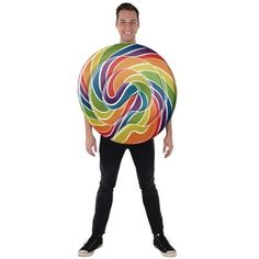 a man holding a giant lollipopo in his hands