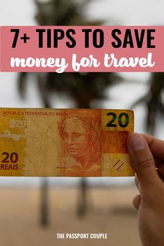 a person holding up a passport with the words 7 tips to save money for travel