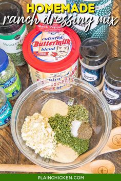 ingredients for homemade ranch dressing in a bowl with wooden spoons and jars on the side