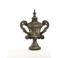 an antique silver vase with ornate designs on the top and sides, sitting against a white background