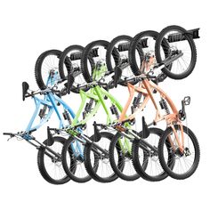 several different bikes are stacked up together