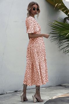 Breezy V-neck Maxi Dress For Beach Season, V-neck Floral Print Maxi Dress For Beach, Orange V-neck Summer Maxi Dress, Summer Printed Maxi V-neck Dress, Breezy V-neck Sundress For Beach Season, Printed V-neck Spring Vacation Dress, Breezy V-neck Beach Cover-up Dress, Orange V-neck Summer Beach Dress, Casual Pink V-neck Dress For Vacation