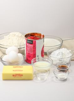 an assortment of ingredients including eggs, butter and flour