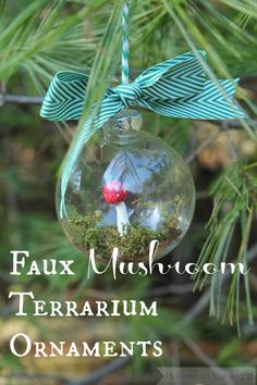 an ornament hanging from a pine tree with the words faux mushrooms terrarium ornaments