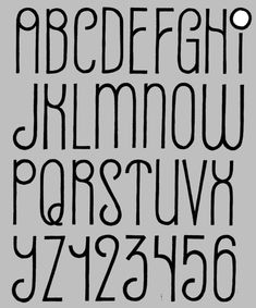 the alphabet is drawn in black ink on a gray background