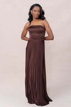 Model: April; Size: 4; Color: Mahogany Mahogany Bridesmaid Dresses, Dark Bridesmaid Dresses, Satin Pleated Dress, Deb Ball, Bridesmaid Duty, Banquet Outfit, Elevated Wedding, Floral Satin Dress, Pleated Satin Dress