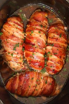 bacon wrapped in bacon and garnished with parsley on the side, ready to be cooked