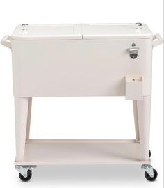 a white cooler sitting on top of a cart