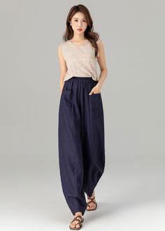 "Deep navy lantern-style wide-leg linen pants. The wide-leg silhouette adds movement and charm, while the high-quality linen fabric provides both comfort and durability. The deep navy color exudes sophistication, making it suitable for various settings. Whether you're aiming for a casual or a more polished look, these deep navy lantern-style wide-leg linen pants will make you stand out with their unique design. DETAIL * 50% linen, 50% cotton * Elastic waist pants * Two pockets * Ankle Length * Wash by hand or machine with cold water. MODEL SIZE Bust 85 cm(33.4\")  Waist 67 cm(26.7\")  Height 168cm (5' 6\") She wears size XS CUSTOM MADE SERVICE If you * Need a Better fit * Can't find your size in the size Chart * Change the Length * Your Height is not Between 5'1\" - 5\"9\" * Your weight fr Womens Linen Pants, Long Linen Pants, Loose Linen Pants, Spring Pants, Pants Custom, Water Model, Tailored Clothes, Best Winter Outfits, Body Measurement