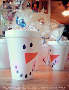 three cups with snowmen painted on them