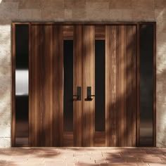 two wooden doors with glass panels on the outside