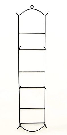 a tall metal shelf with four shelves on each side and an iron rod at the top