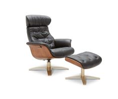 the reclining chair and ottoman is shown in black leather with wooden legs, which are also